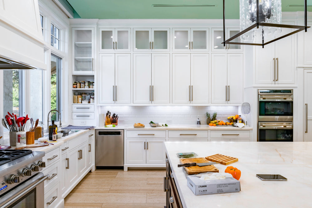 Large Transitional White Kitchen with Marble Countertops and Grand Island with Seating