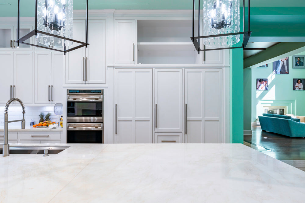 Large Transitional White Kitchen with Marble Countertops and Grand Island with Seating