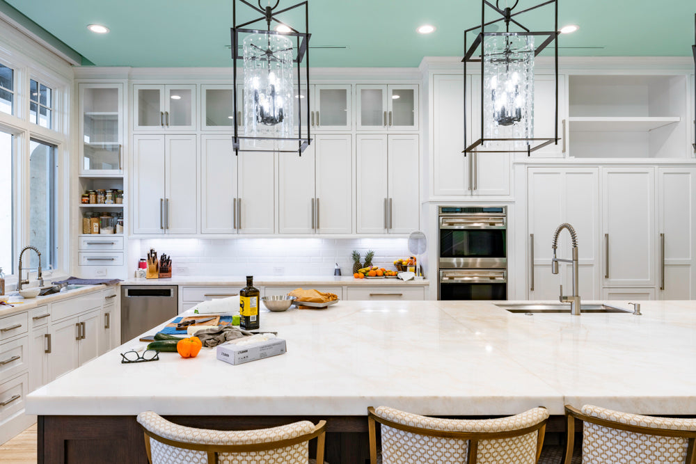 Large Transitional White Kitchen with Marble Countertops and Grand Island with Seating