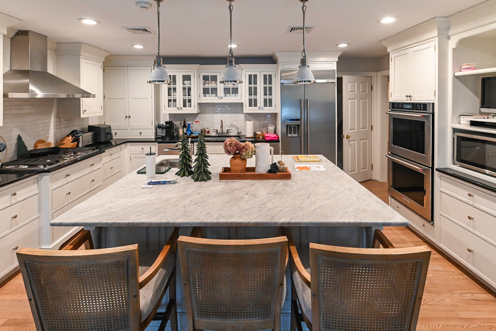 Traditional White Kitchen with Marble Top Island and Appliances
