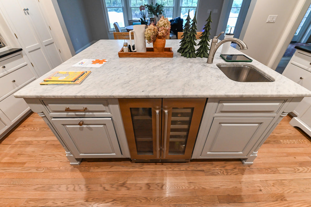 Traditional White Kitchen with Marble Top Island and Appliances