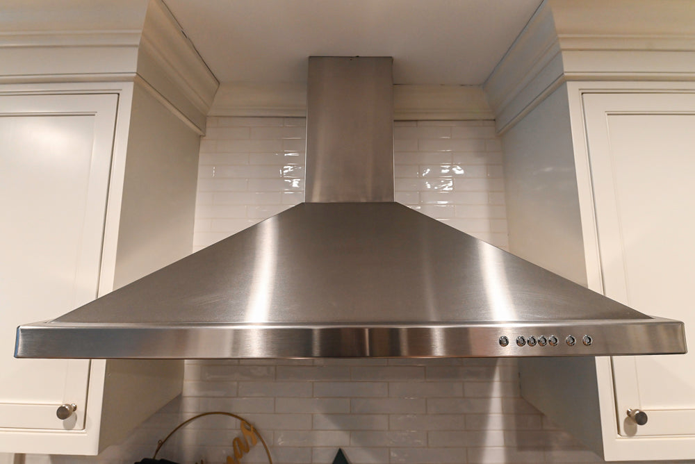 Traditional White Kitchen with Marble Top Island and Appliances