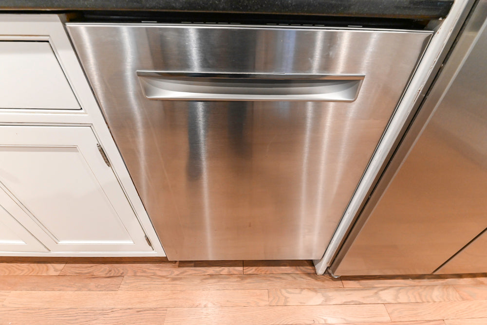 Traditional White Kitchen with Marble Top Island and Appliances