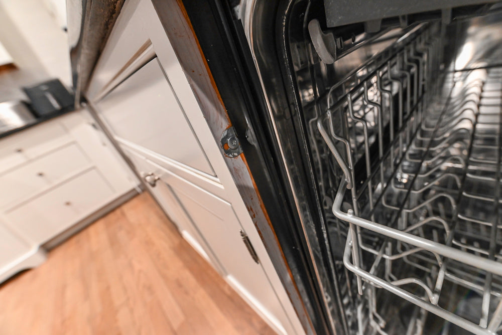 Traditional White Kitchen with Marble Top Island and Appliances