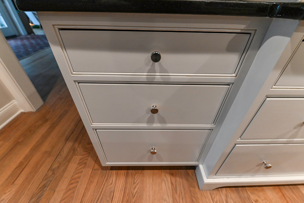 Traditional White Kitchen with Marble Top Island and Appliances