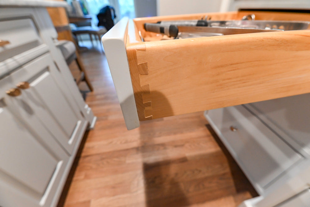 Traditional White Kitchen with Marble Top Island and Appliances