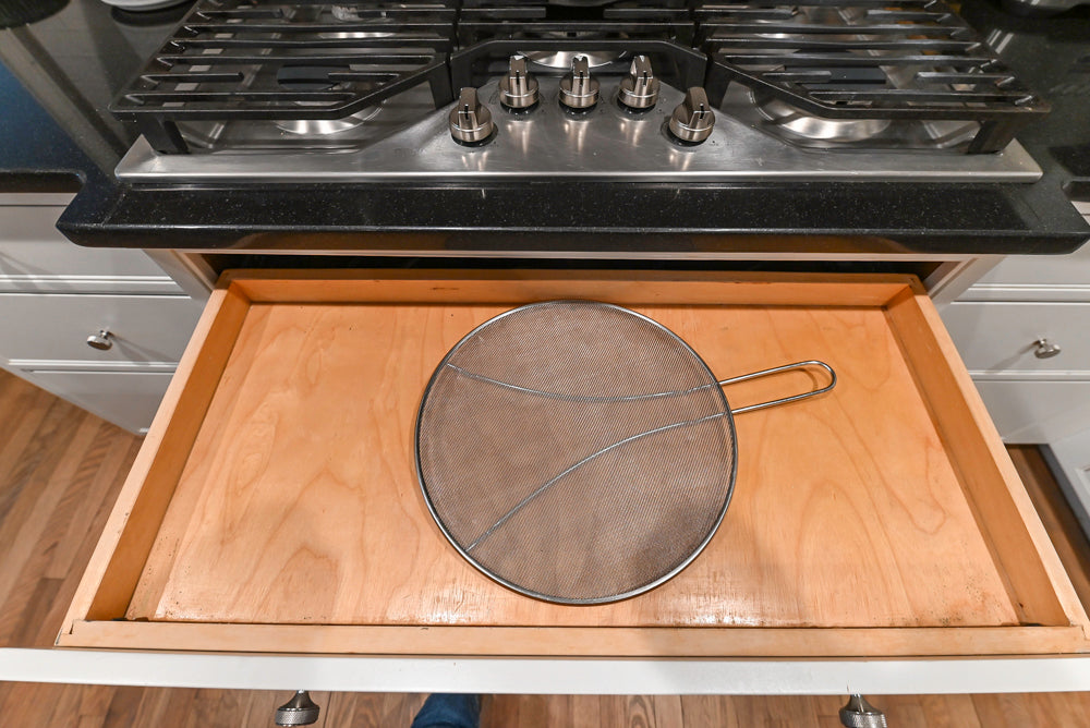 Traditional White Kitchen with Marble Top Island and Appliances
