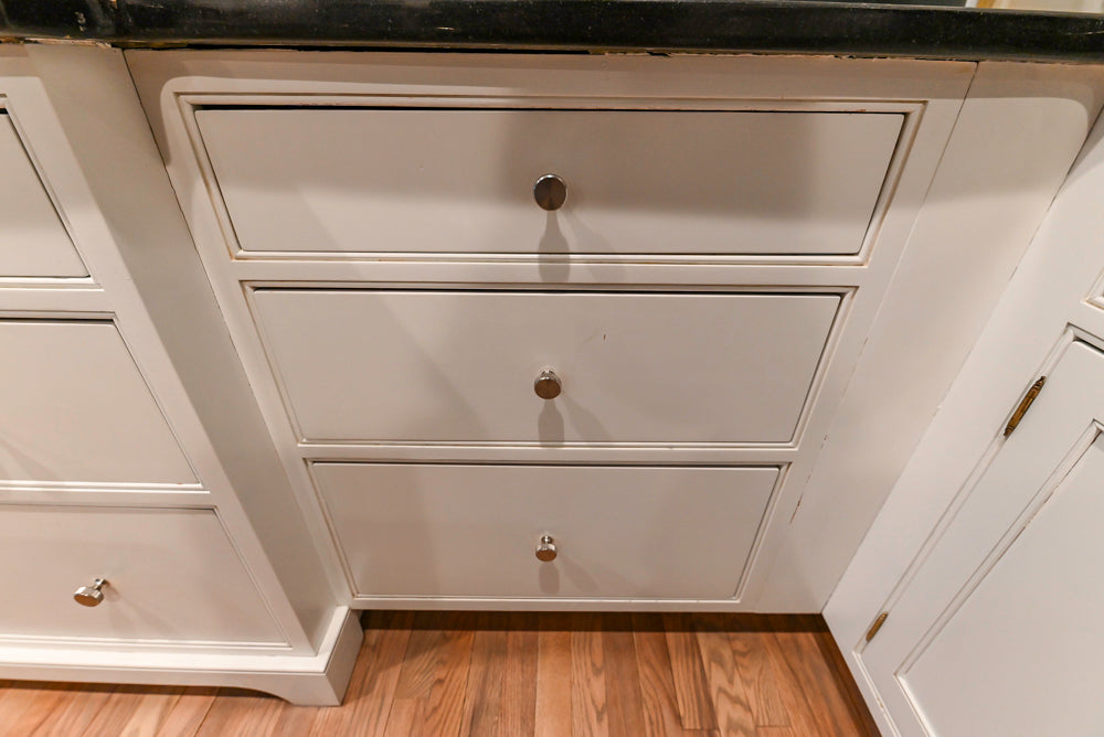 Traditional White Kitchen with Marble Top Island and Appliances