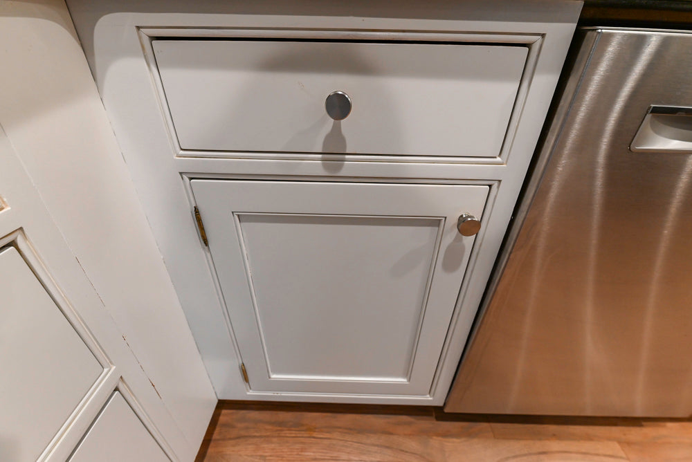 Traditional White Kitchen with Marble Top Island and Appliances