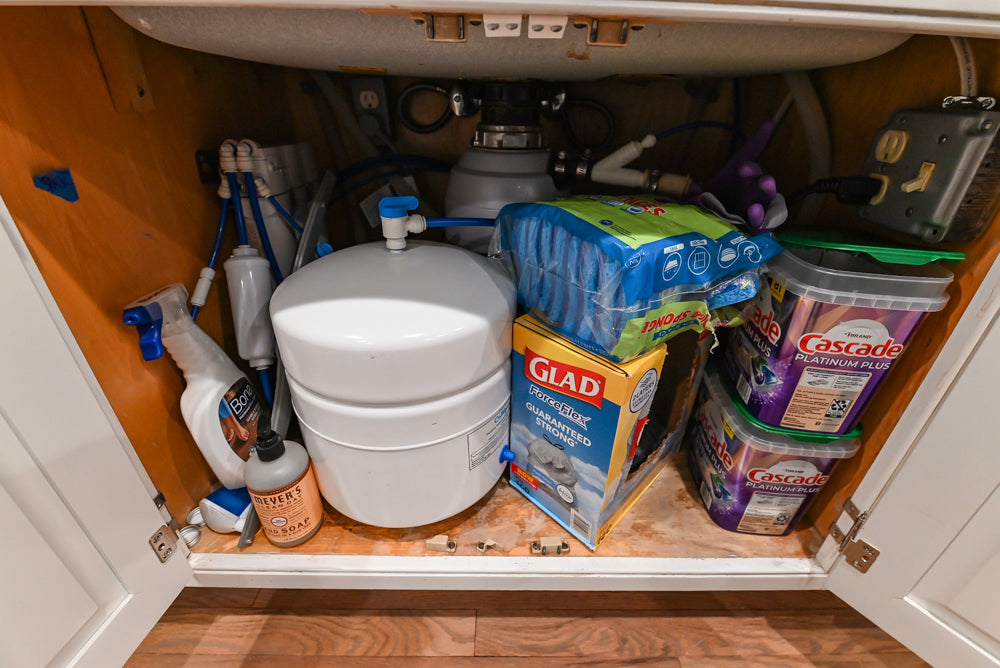 Traditional White Kitchen with Marble Top Island and Appliances