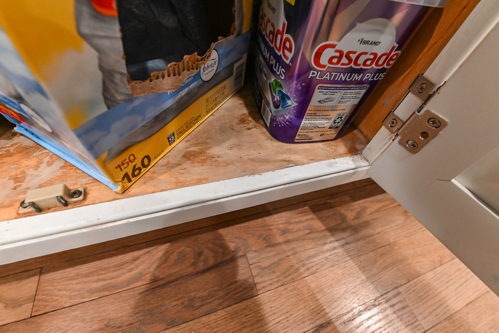 Traditional White Kitchen with Marble Top Island and Appliances
