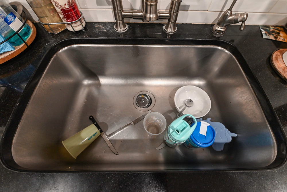 Traditional White Kitchen with Marble Top Island and Appliances