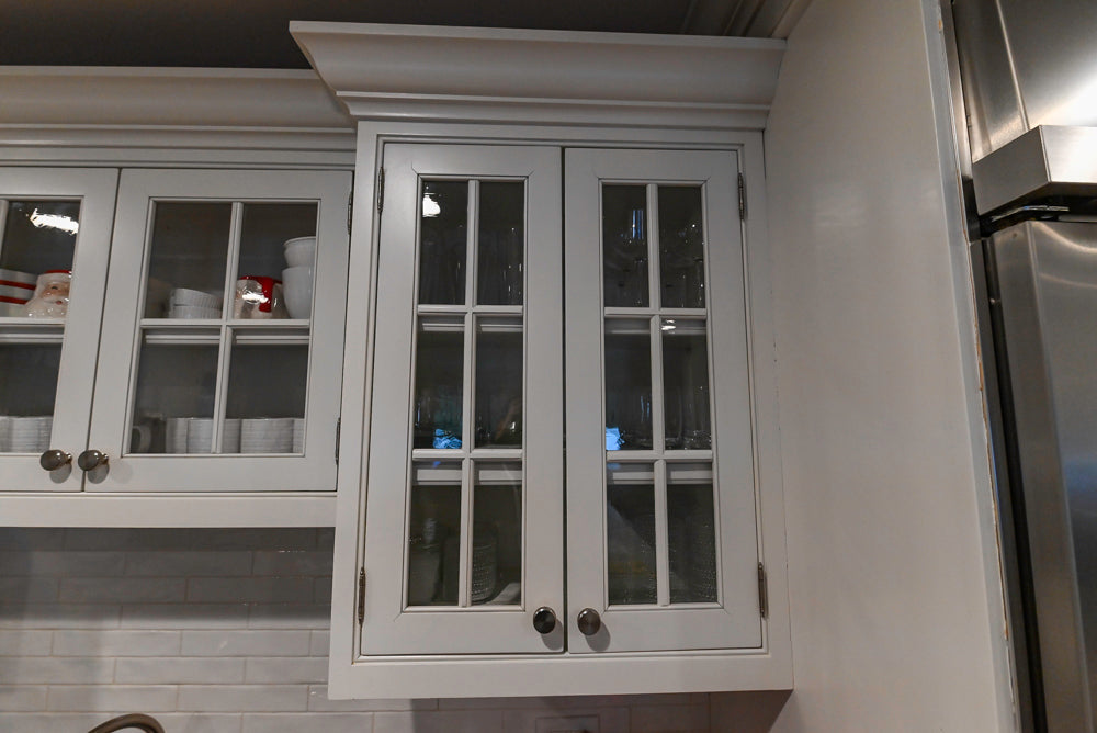 Traditional White Kitchen with Marble Top Island and Appliances