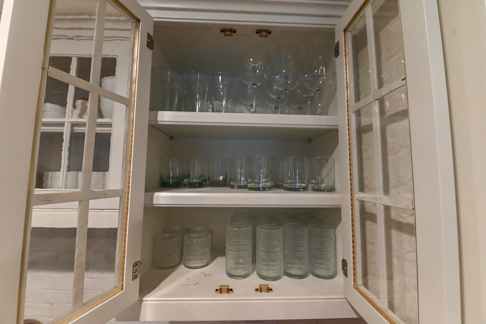 Traditional White Kitchen with Marble Top Island and Appliances