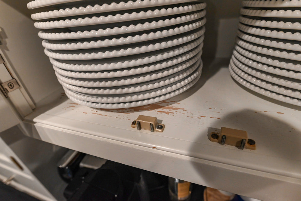 Traditional White Kitchen with Marble Top Island and Appliances