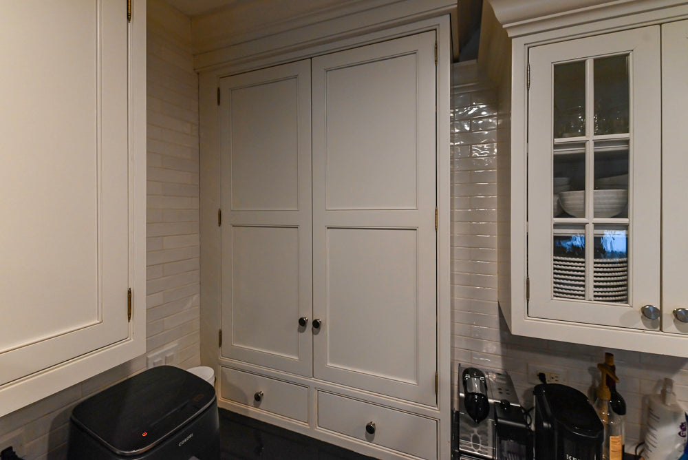Traditional White Kitchen with Marble Top Island and Appliances
