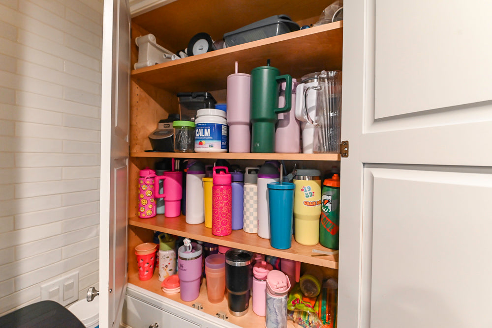 Traditional White Kitchen with Marble Top Island and Appliances