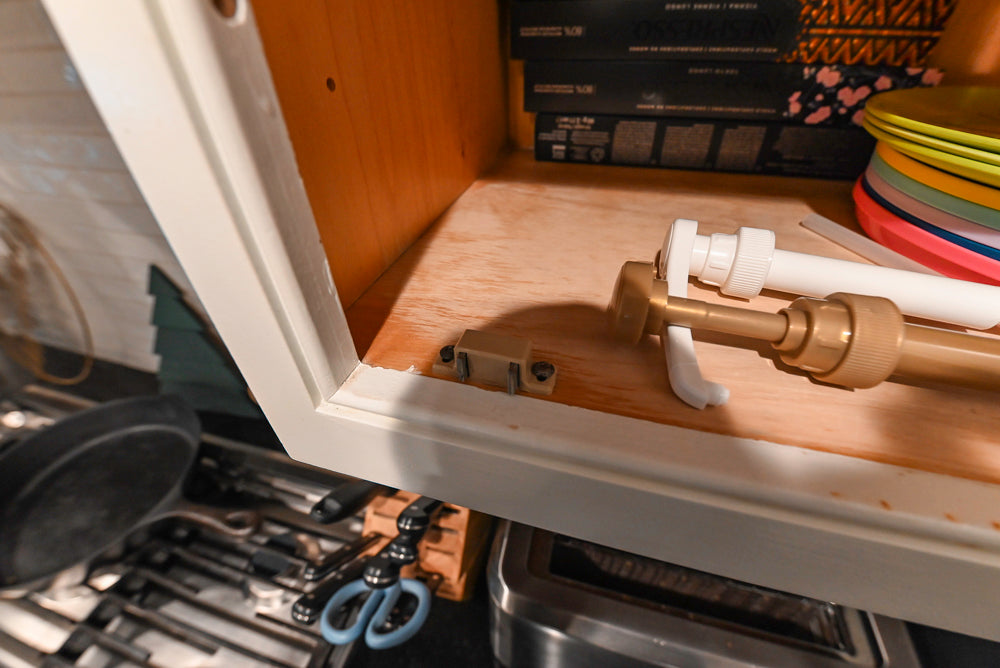 Traditional White Kitchen with Marble Top Island and Appliances