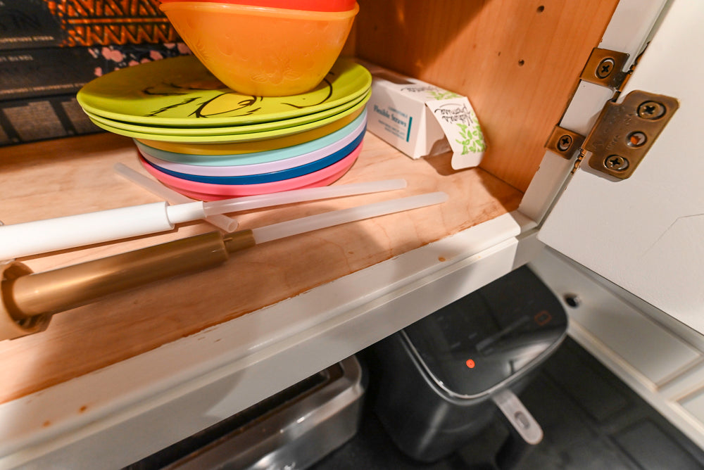 Traditional White Kitchen with Marble Top Island and Appliances
