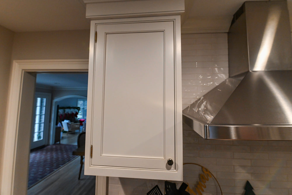 Traditional White Kitchen with Marble Top Island and Appliances
