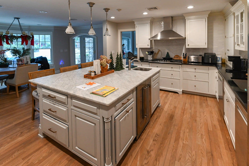 Traditional White Kitchen with Marble Top Island and Appliances