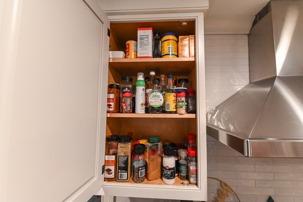 Traditional White Kitchen with Marble Top Island and Appliances