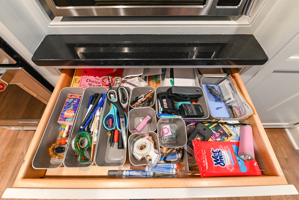 Traditional White Kitchen with Marble Top Island and Appliances