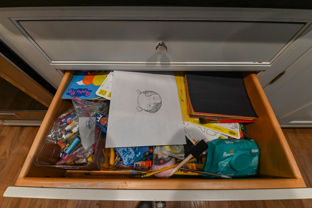 Traditional White Kitchen with Marble Top Island and Appliances
