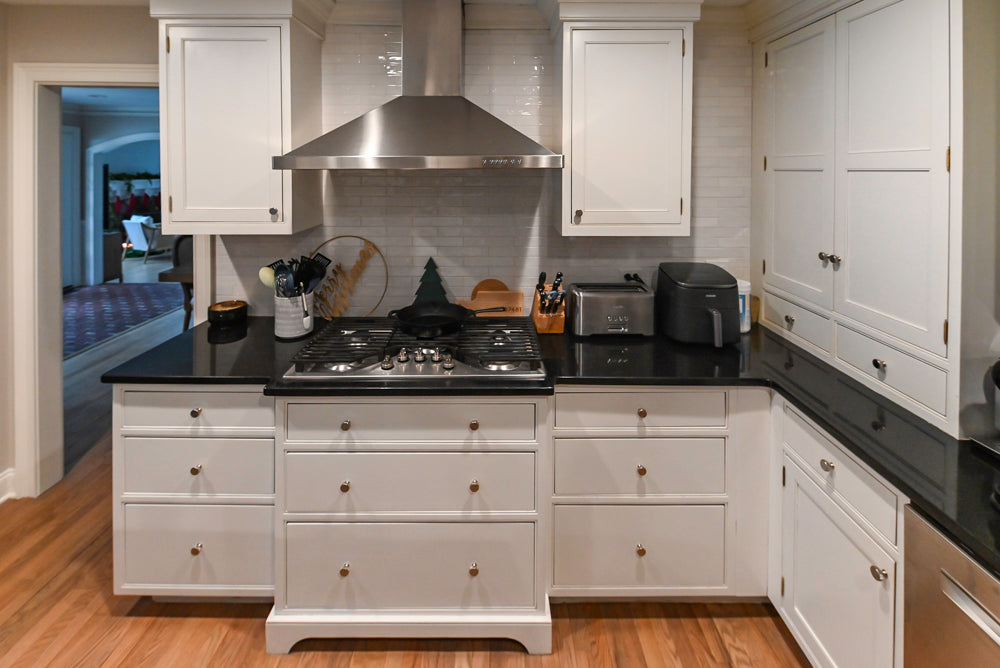 Traditional White Kitchen with Marble Top Island and Appliances