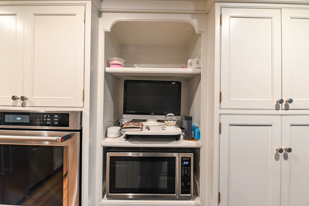 Traditional White Kitchen with Marble Top Island and Appliances