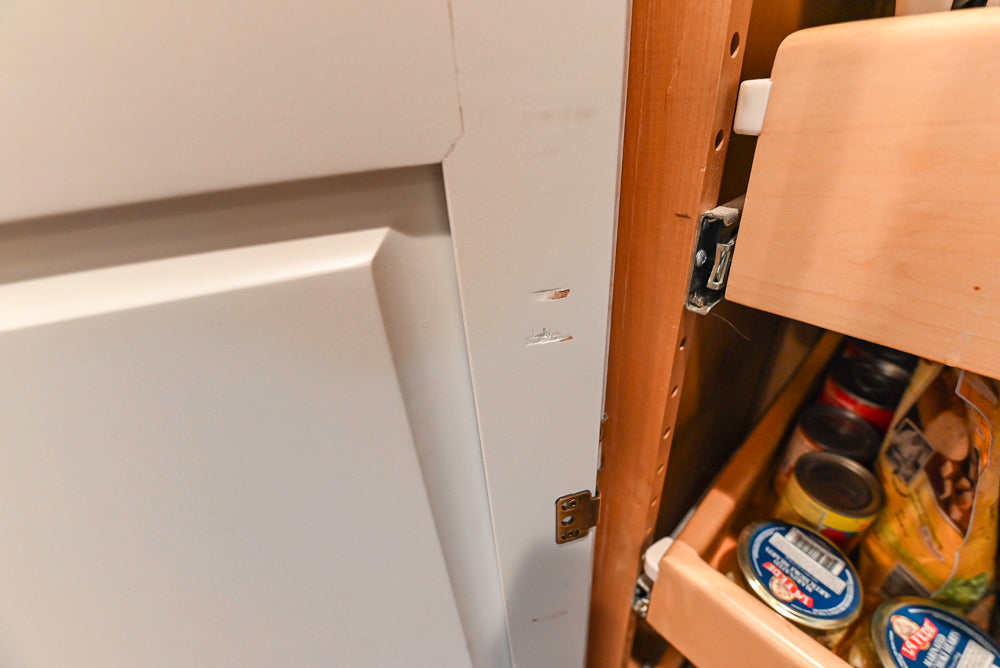 Traditional White Kitchen with Marble Top Island and Appliances