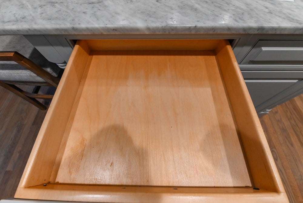 Traditional White Kitchen with Marble Top Island and Appliances
