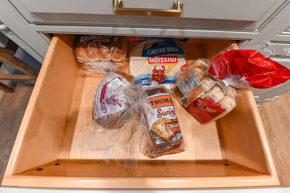 Traditional White Kitchen with Marble Top Island and Appliances