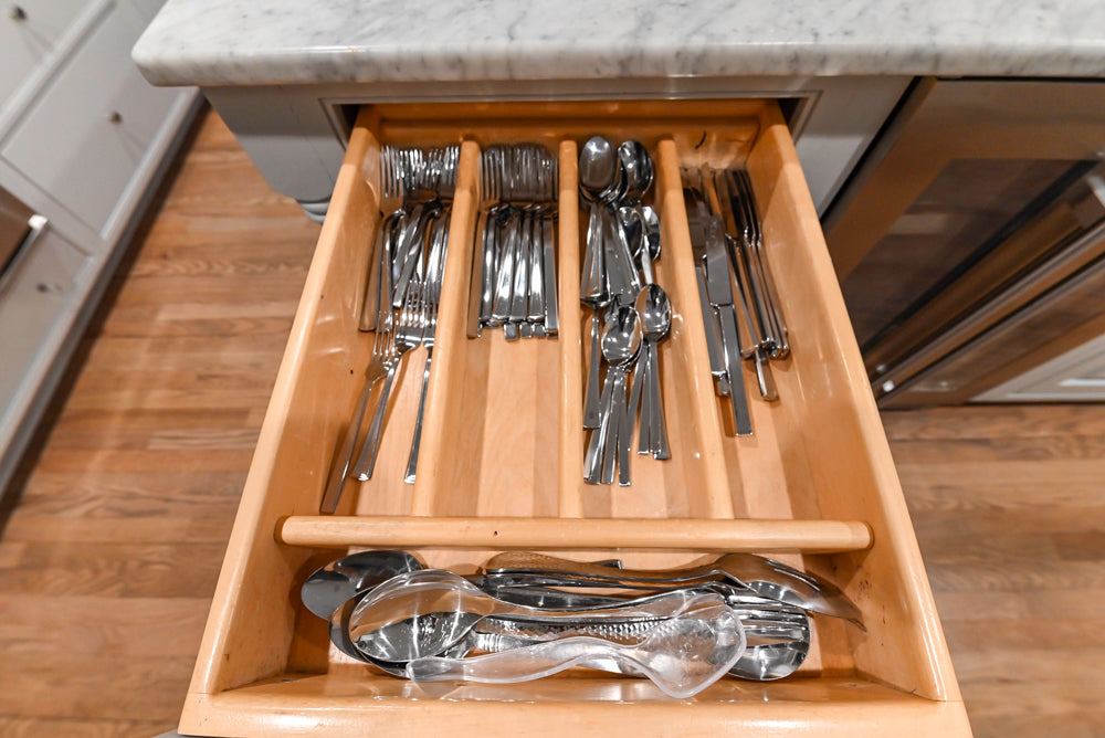 Traditional White Kitchen with Marble Top Island and Appliances