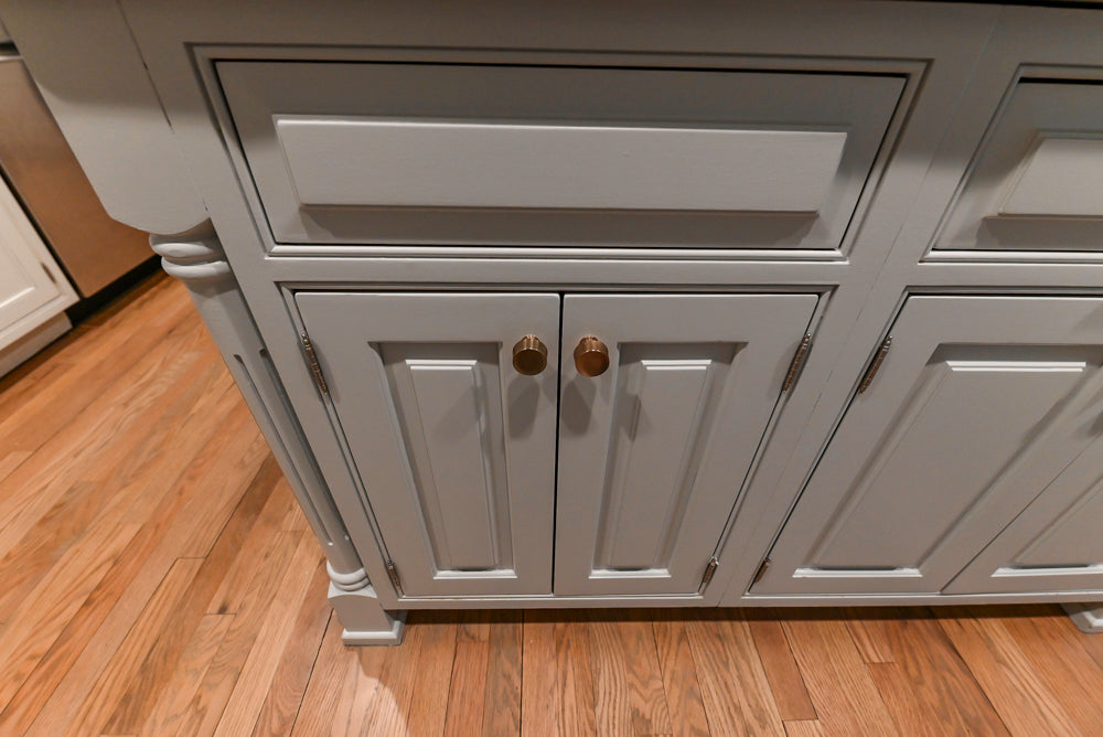 Traditional White Kitchen with Marble Top Island and Appliances