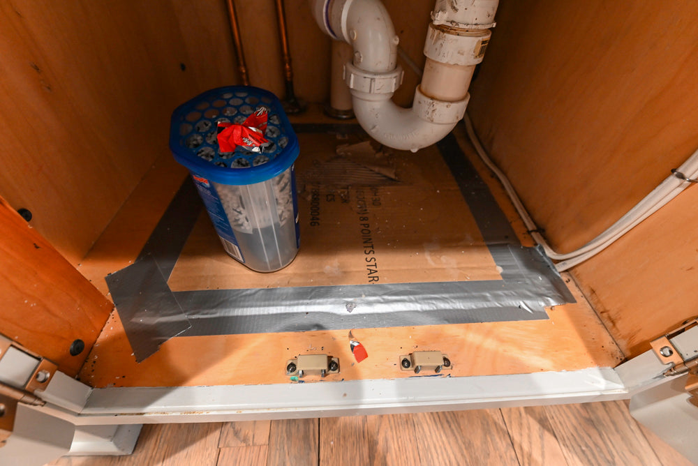 Traditional White Kitchen with Marble Top Island and Appliances