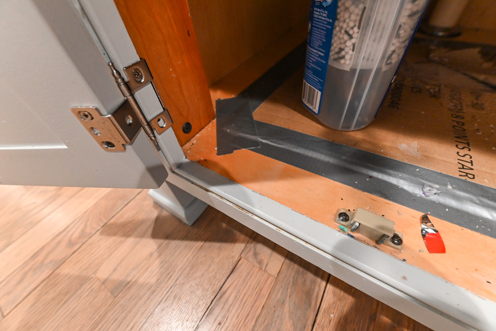 Traditional White Kitchen with Marble Top Island and Appliances