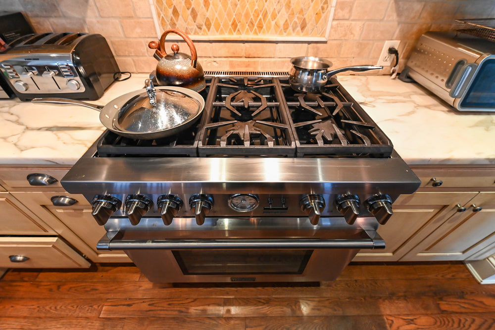 Traditional Cream Kitchen with Island, Wet Bar, Marble Countertops & Appliances