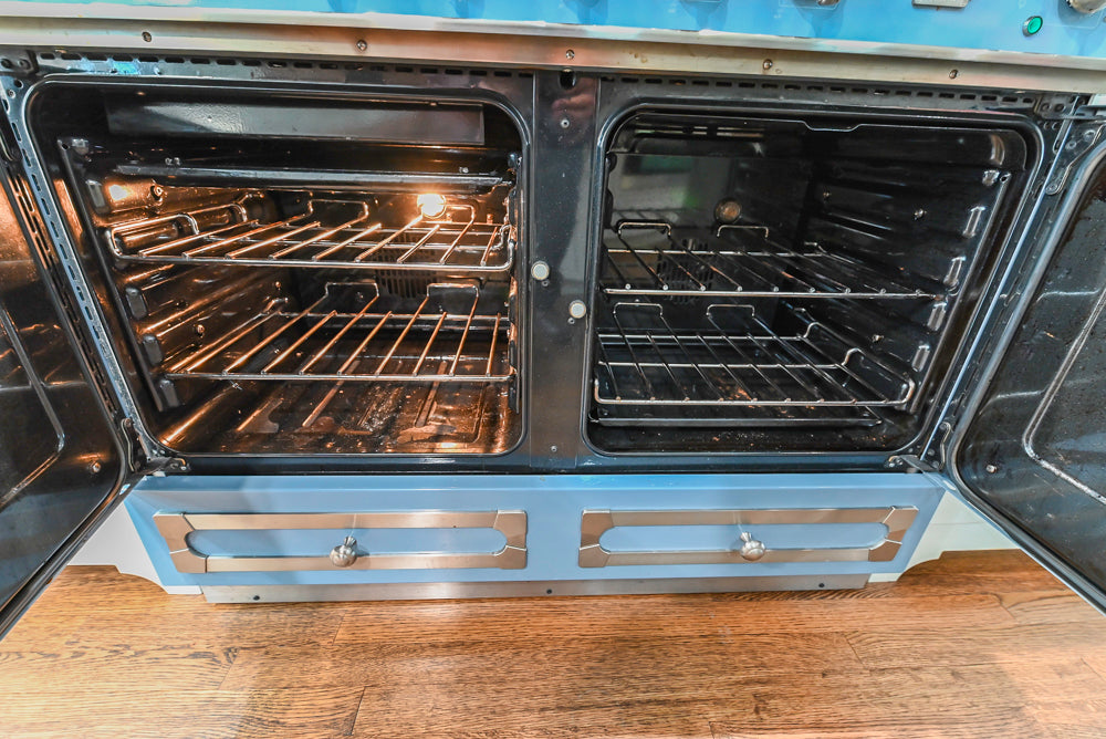 Canterbury Traditional White Kitchen with Island, Marble Countertops and La Cornue Range with Matching Hood