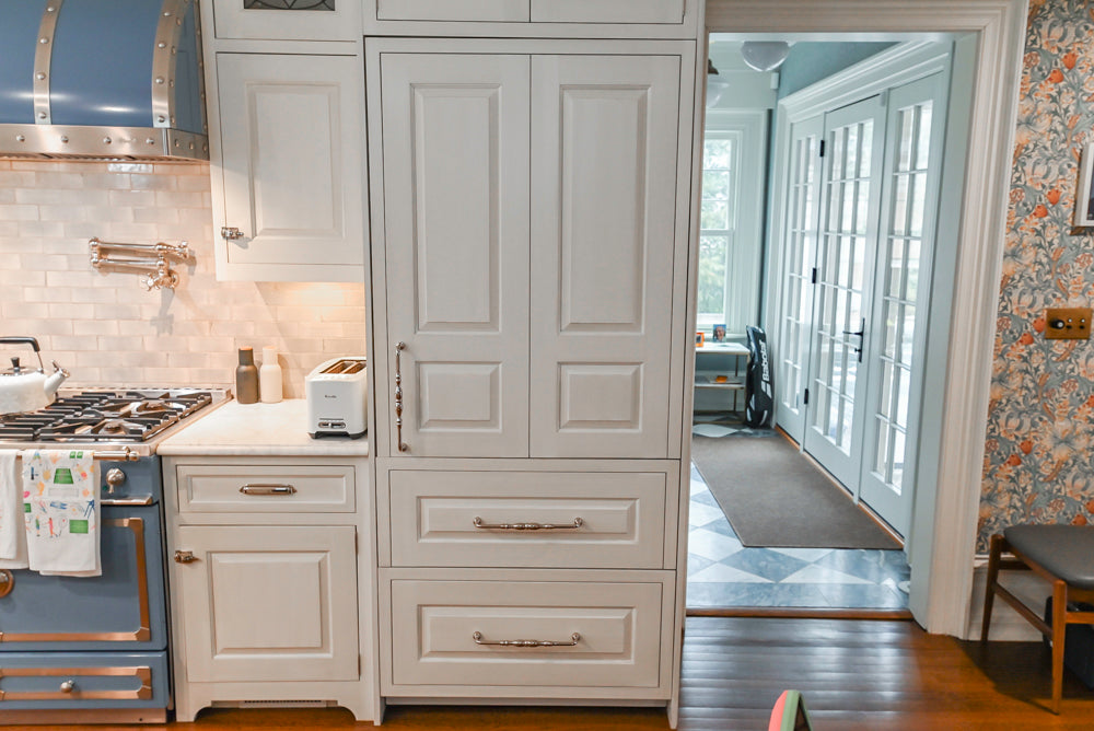 Canterbury Traditional White Kitchen with Island, Marble Countertops and La Cornue Range with Matching Hood