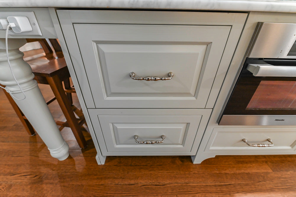 Canterbury Traditional White Kitchen with Island, Marble Countertops and La Cornue Range with Matching Hood
