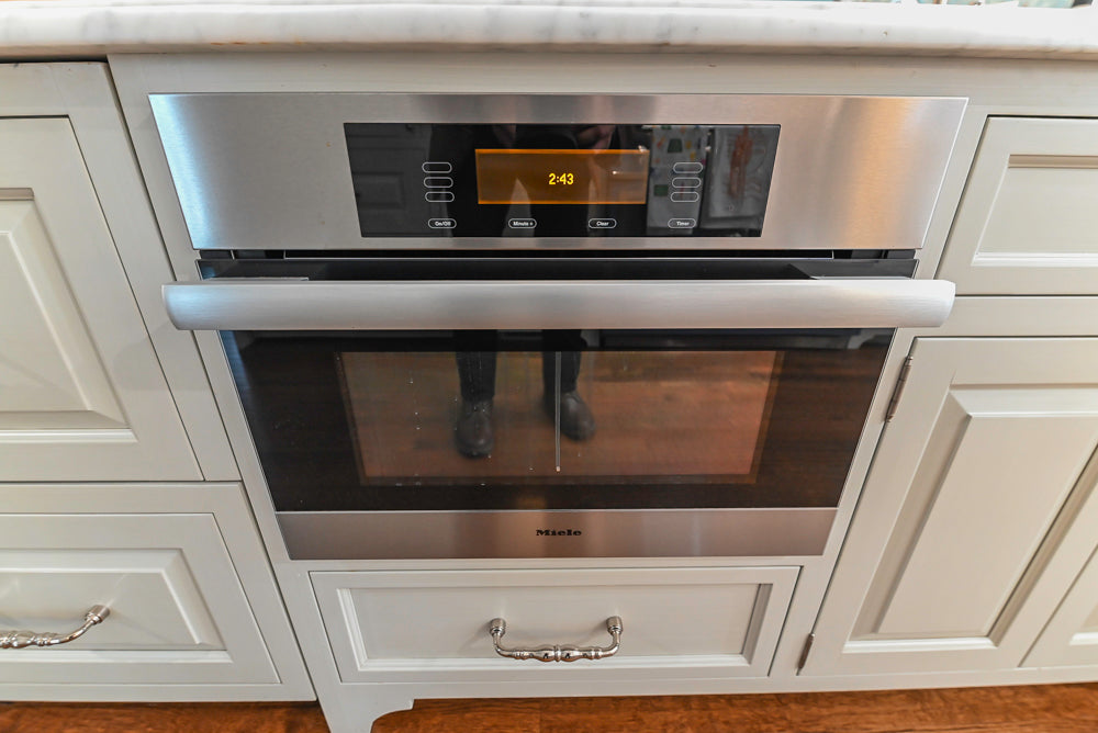 Canterbury Traditional White Kitchen with Island, Marble Countertops and La Cornue Range with Matching Hood