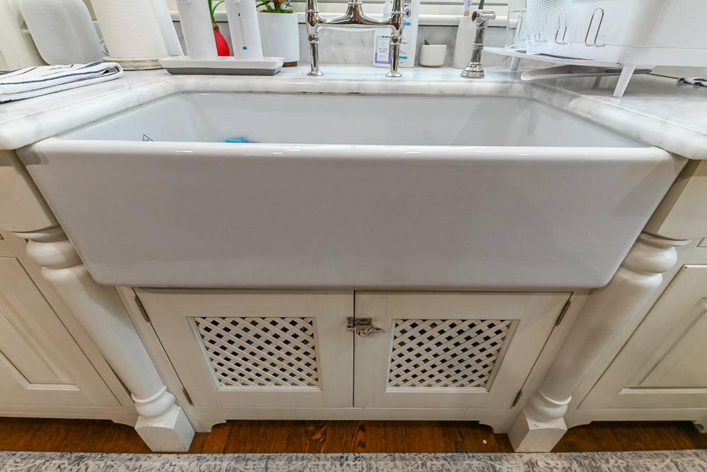 Canterbury Traditional White Kitchen with Island, Marble Countertops and La Cornue Range with Matching Hood