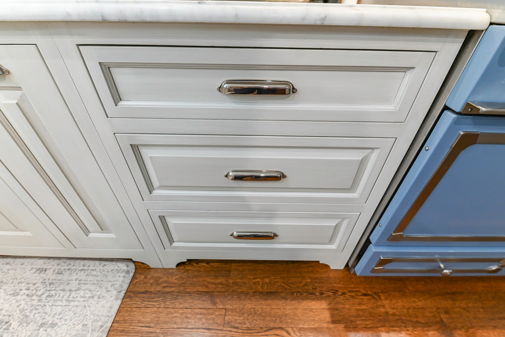 Canterbury Traditional White Kitchen with Island, Marble Countertops and La Cornue Range with Matching Hood
