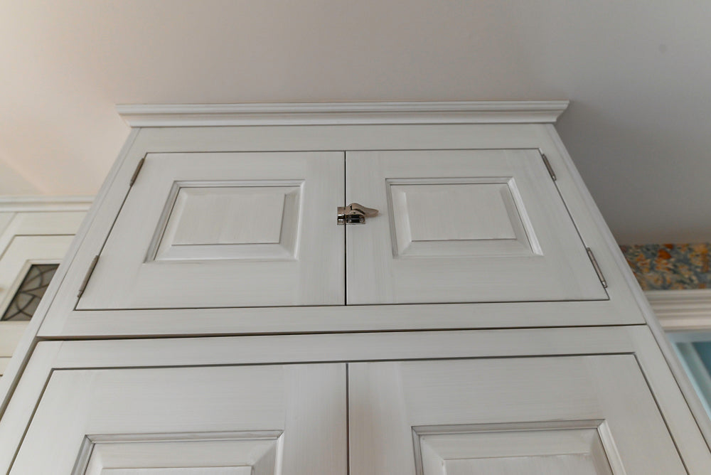 Canterbury Traditional White Kitchen with Island, Marble Countertops and La Cornue Range with Matching Hood