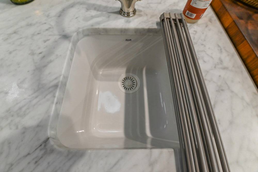 Canterbury Traditional White Kitchen with Island, Marble Countertops and La Cornue Range with Matching Hood