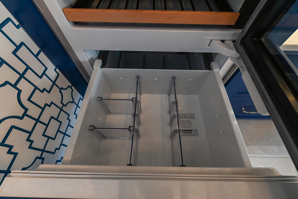 Gemcraft Navy Blue Pantry with White Quartz Countertops and Sub-Zero Tall Wine Cooler