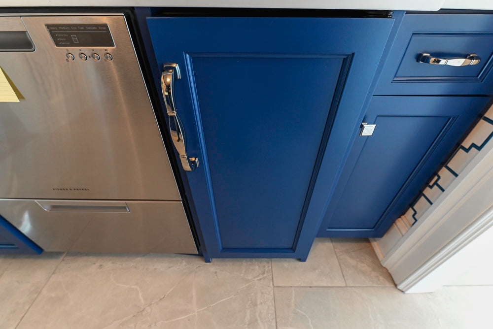 Gemcraft Navy Blue Pantry with White Quartz Countertops and Sub-Zero Tall Wine Cooler