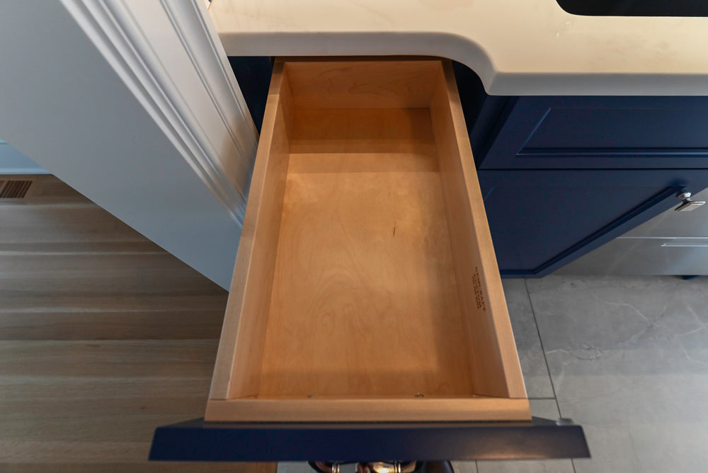 Gemcraft Navy Blue Pantry with White Quartz Countertops and Sub-Zero Tall Wine Cooler