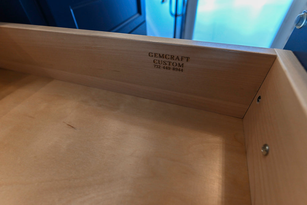 Gemcraft Navy Blue Pantry with White Quartz Countertops and Sub-Zero Tall Wine Cooler